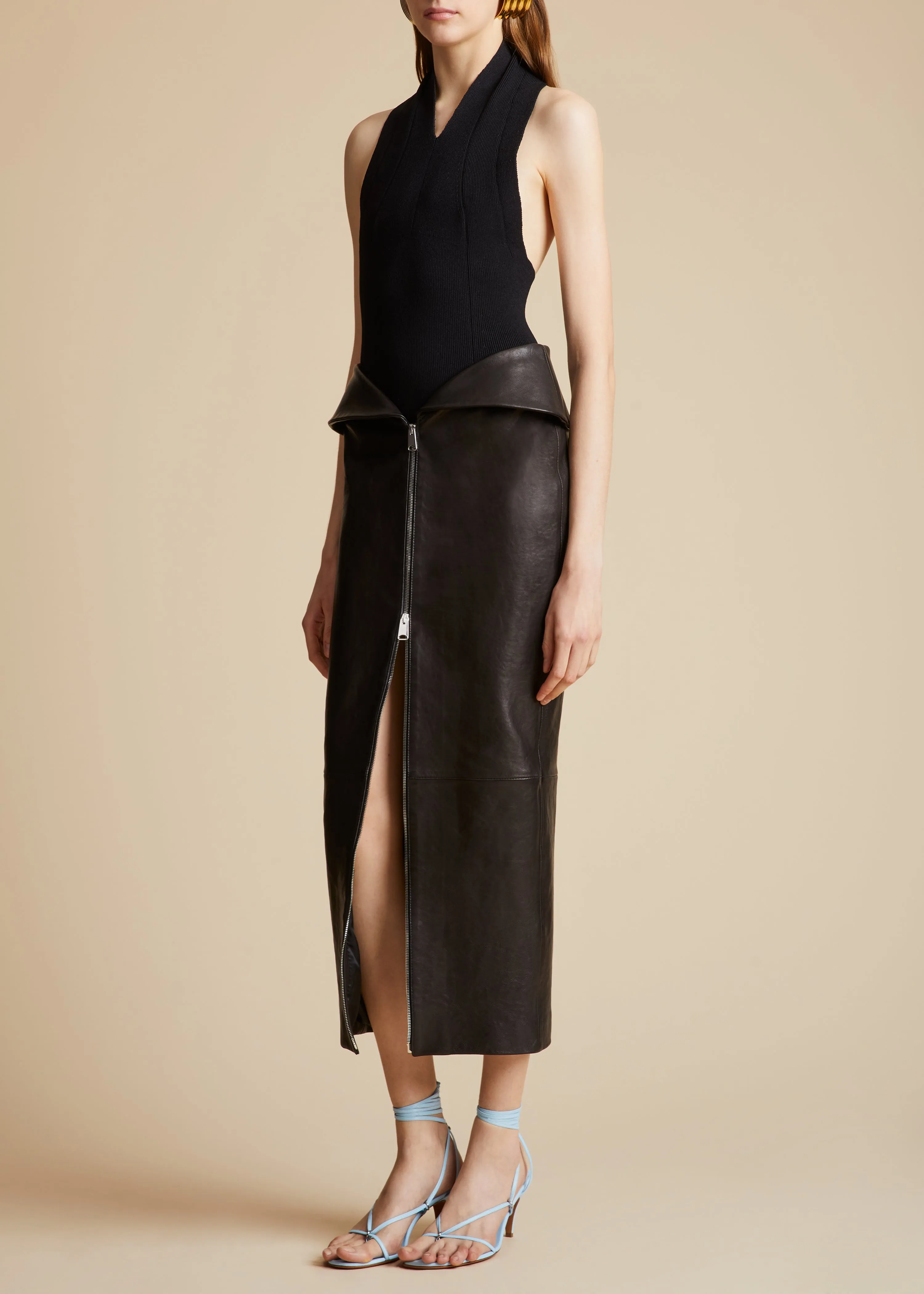 The Pepita Skirt in Black Leather sold by KHAITE