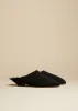 The Otto Mule in Black Suede with Shearling sold by KHAITE