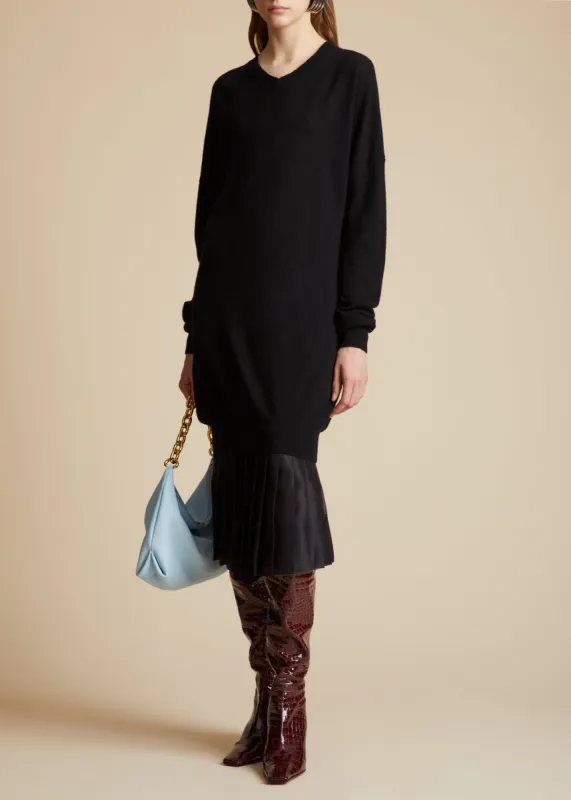 The Tudi Skirt in Black sold by KHAITE