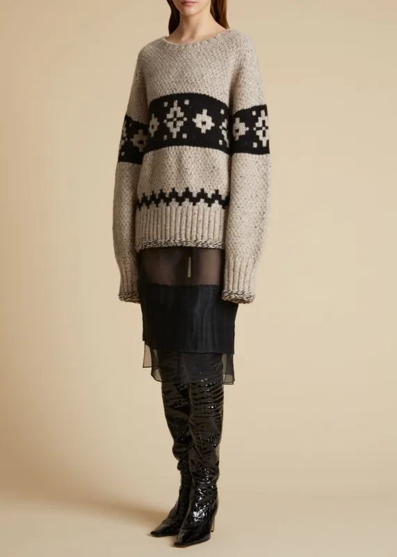 The Tabi Sweater in Biscuit sold by KHAITE