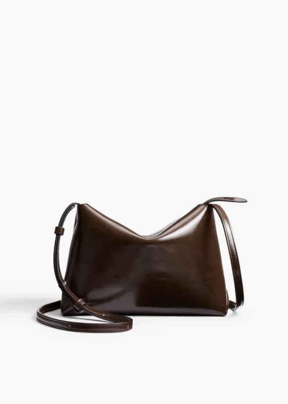 Lina Crossbody Bag in Chestnut Crackle Patent Leather sold by KHAITE