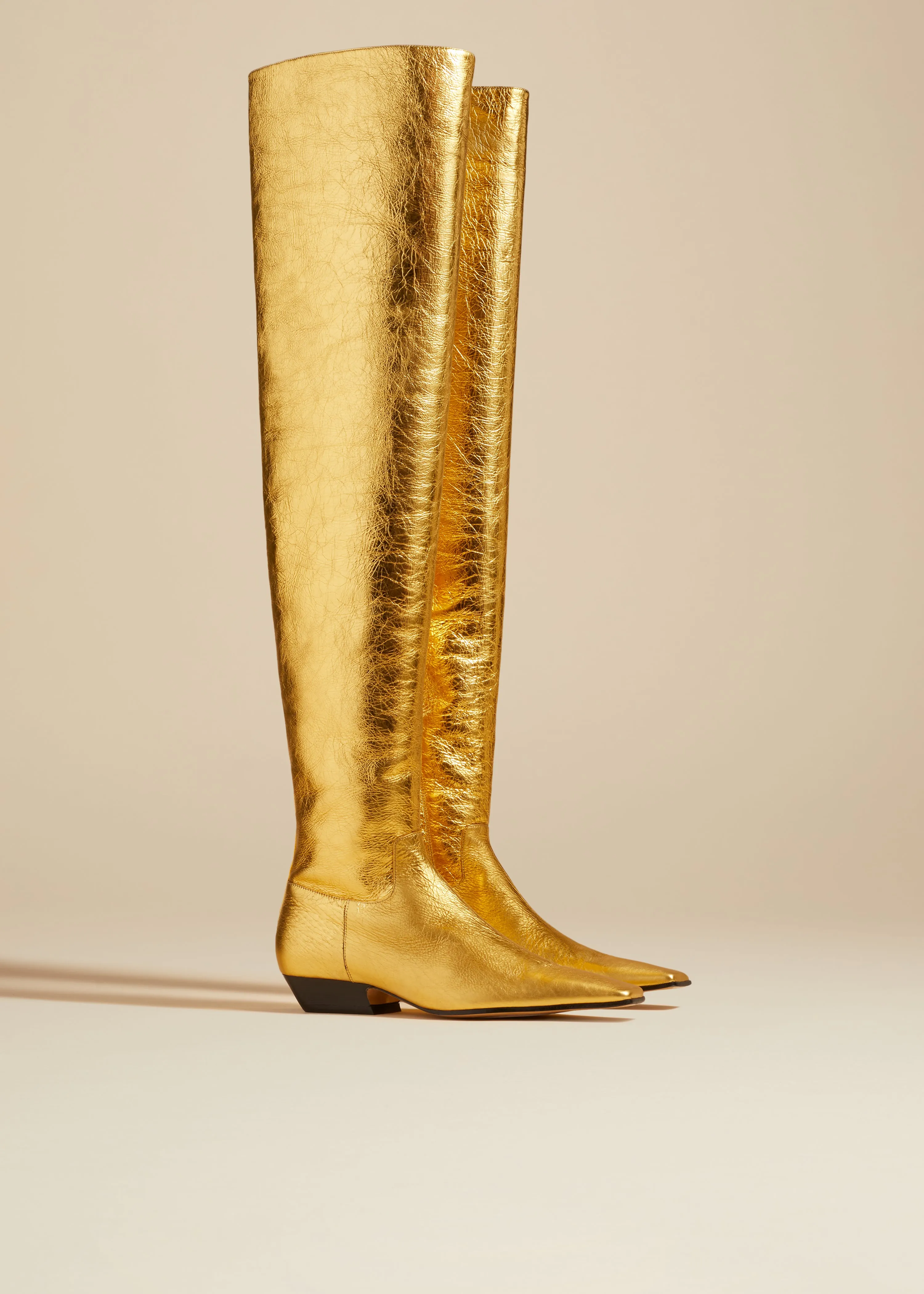 The Marfa Over-the-Knee Flat Boot in Gold Metallic Leather sold by KHAITE product image thumbnail 2