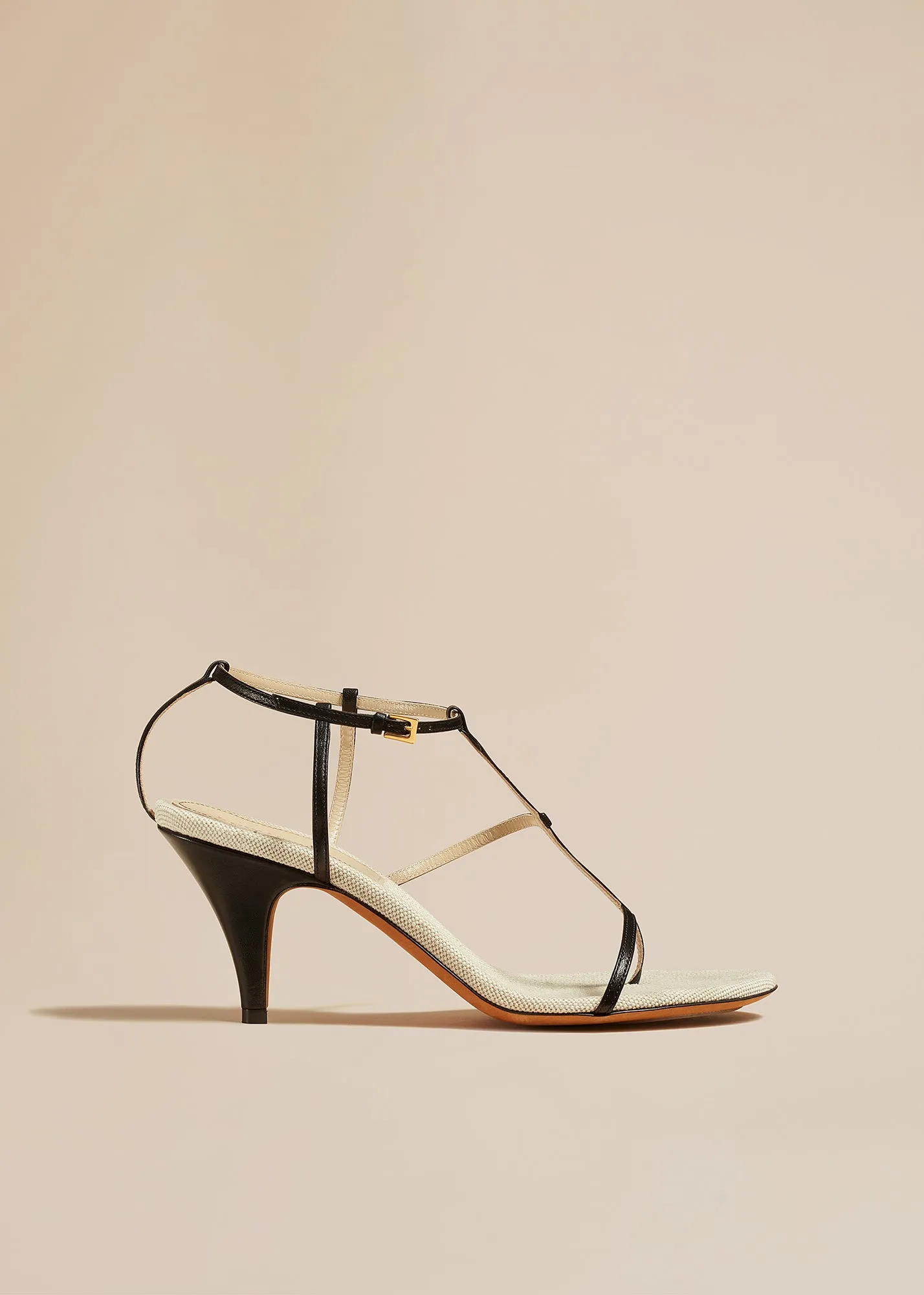 Jones Heel Sandal in Natural and Black Leather sold by KHAITE