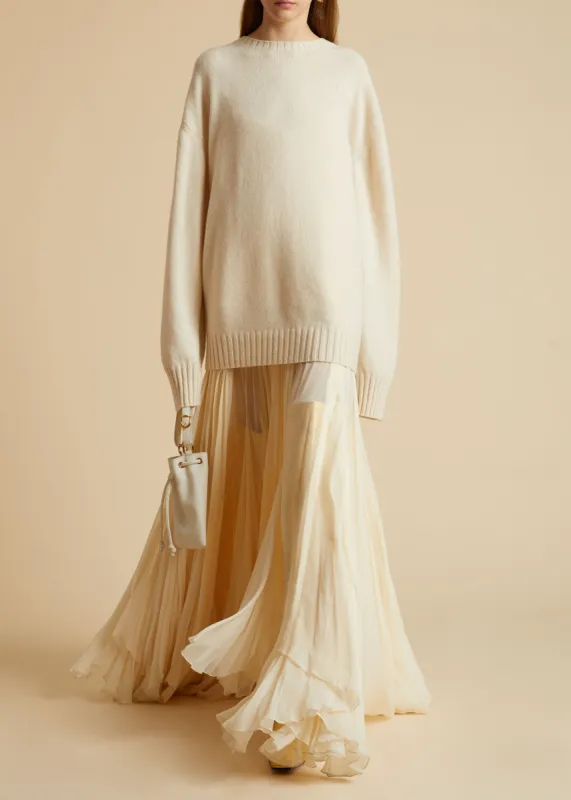 The Camilla Sweater in Magnolia sold by KHAITE