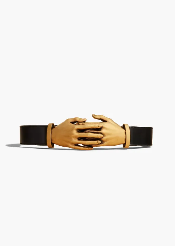 Sculpted Hands Belt in Black Leather with Antique Gold sold by KHAITE