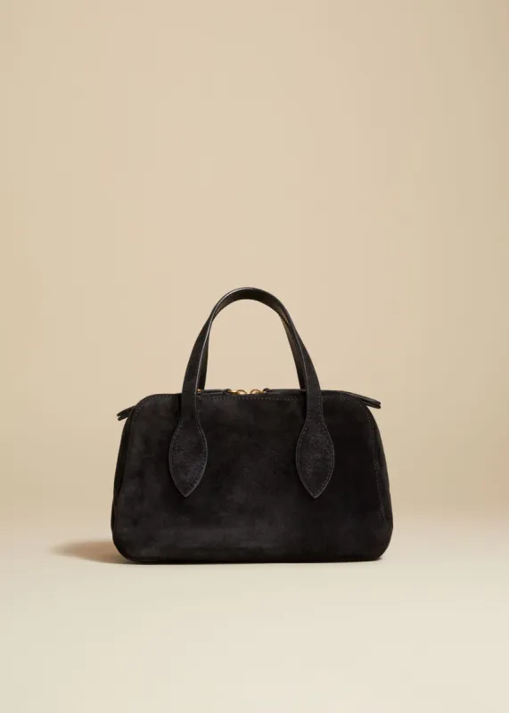 The Small Maeve Crossbody Bag in Black Suede sold by KHAITE