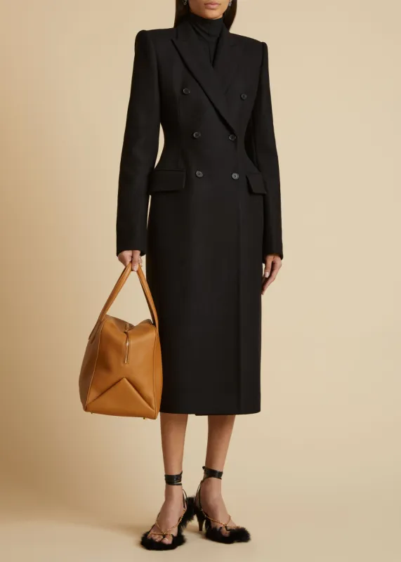 The Carmona Coat in Black sold by KHAITE