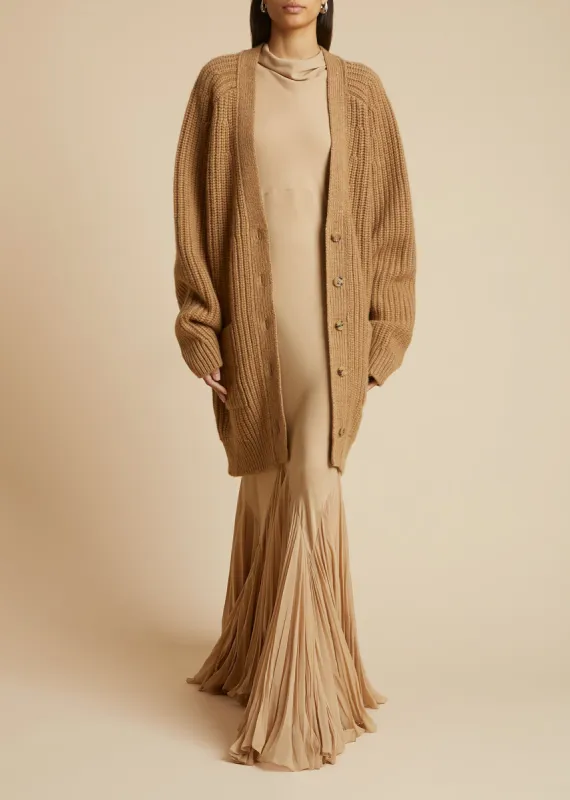 The Milli Cardigan in Camel sold by KHAITE