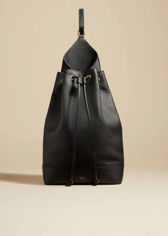 The Medium Greta Backpack in Black Pebbled Leather sold by KHAITE