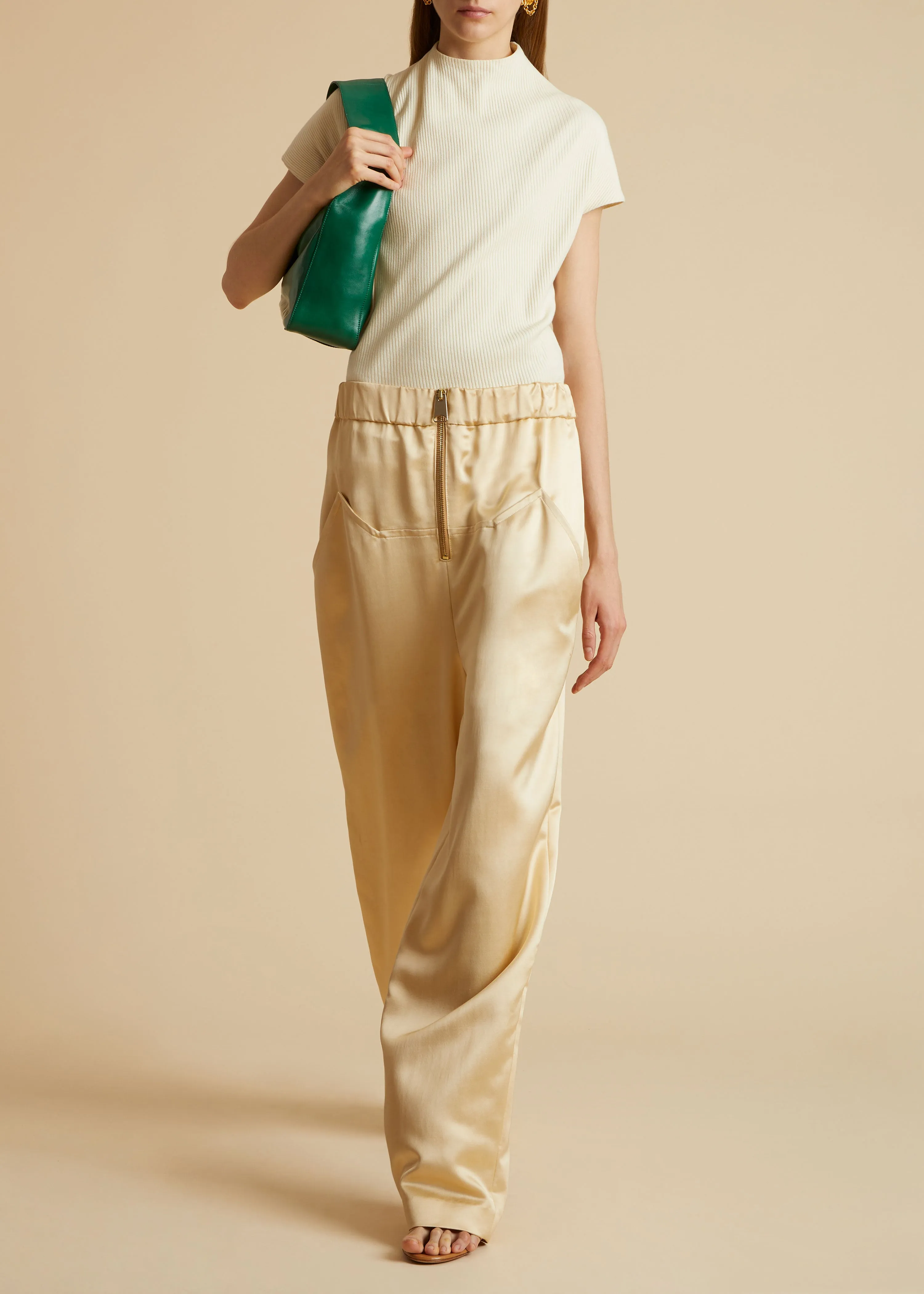 The Felton Pant in Bone sold by KHAITE