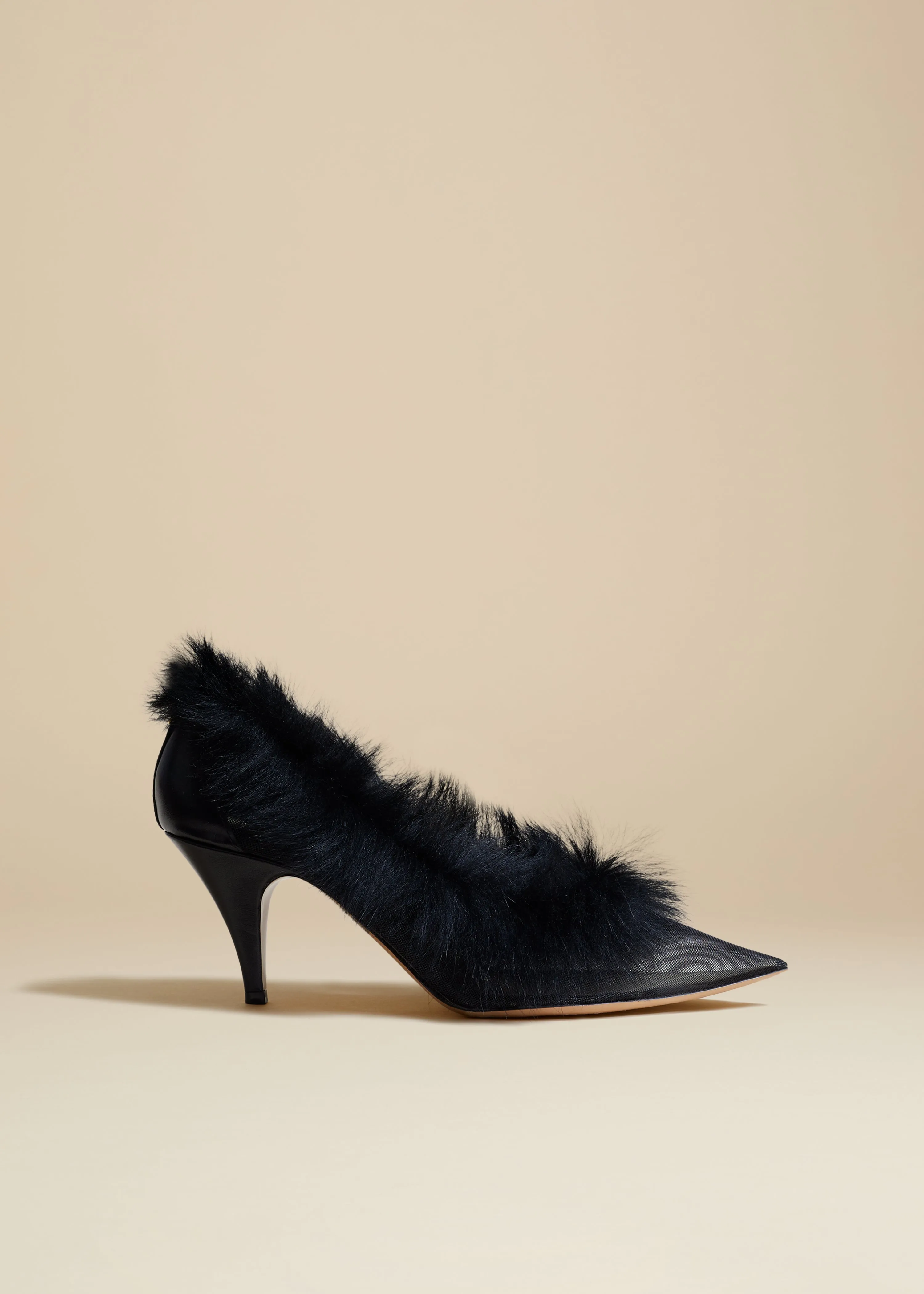 The River Pump in Black Mesh with Shearling sold by KHAITE