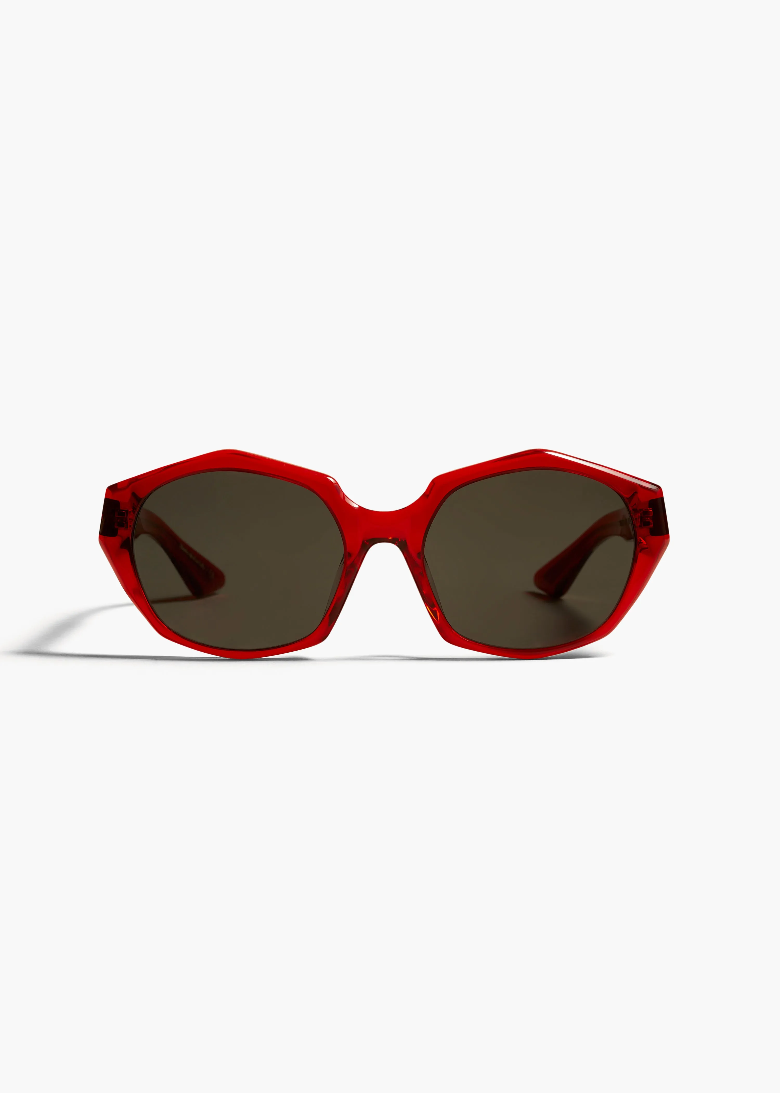 KHAITE x Oliver Peoples 1971C in Translucent Red sold by KHAITE