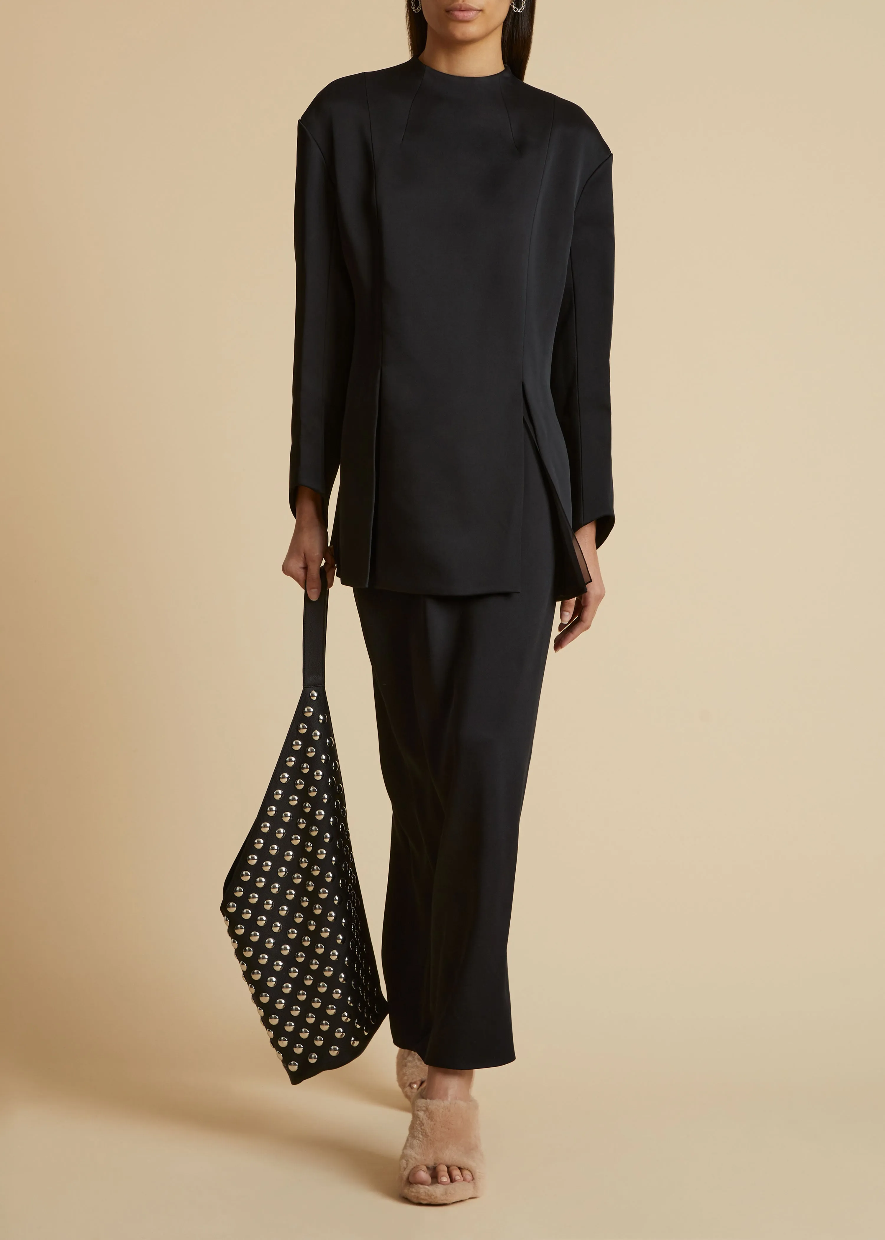 The Mahni Top in Black sold by KHAITE