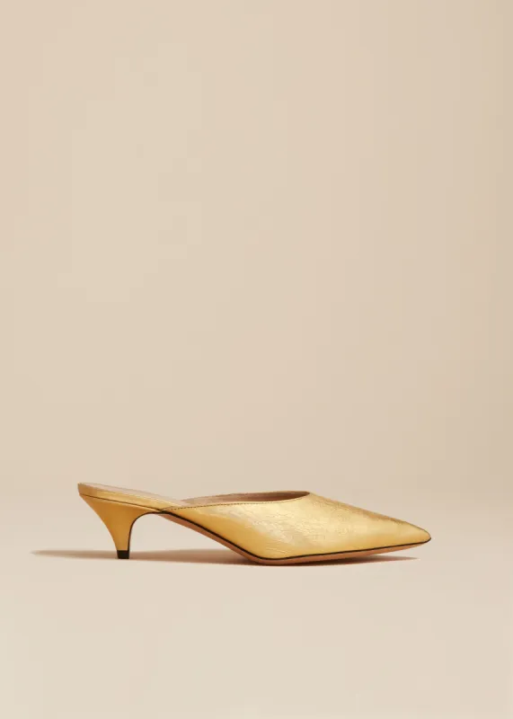 The River Mule in Gold Metallic Leather sold by KHAITE