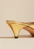The River Mule in Gold Metallic Leather sold by KHAITE