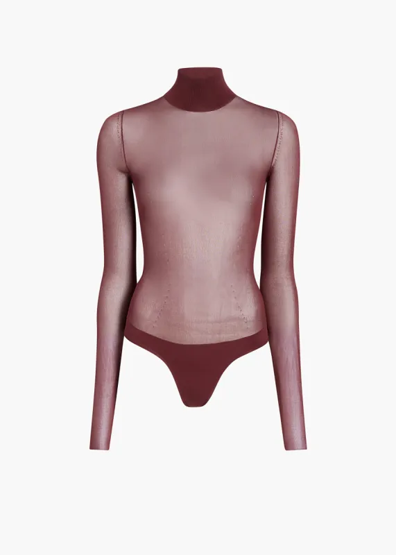 Tallin Bodysuit in Oxblood sold by KHAITE