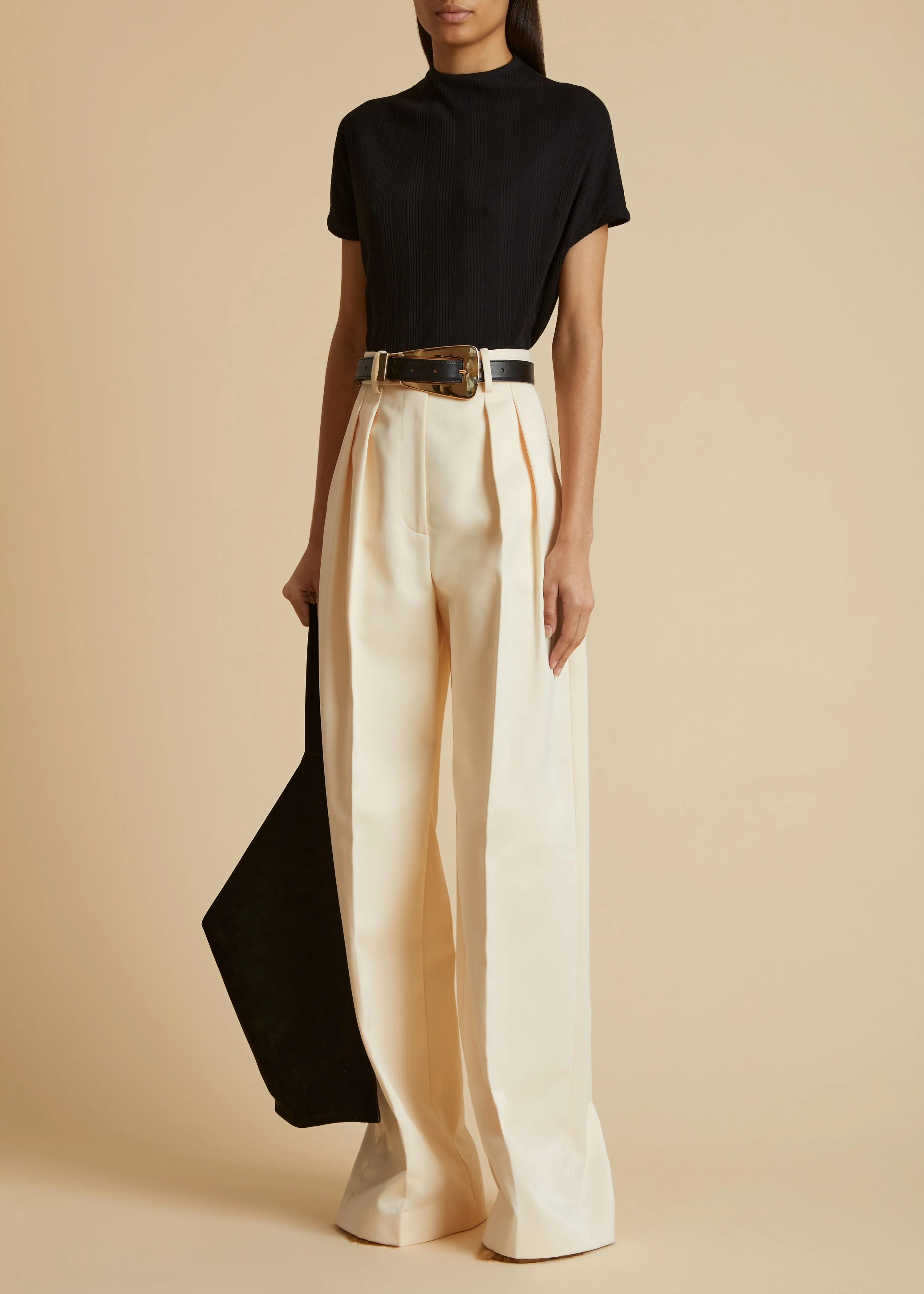 The Teyana Pant in Bone Satin sold by KHAITE