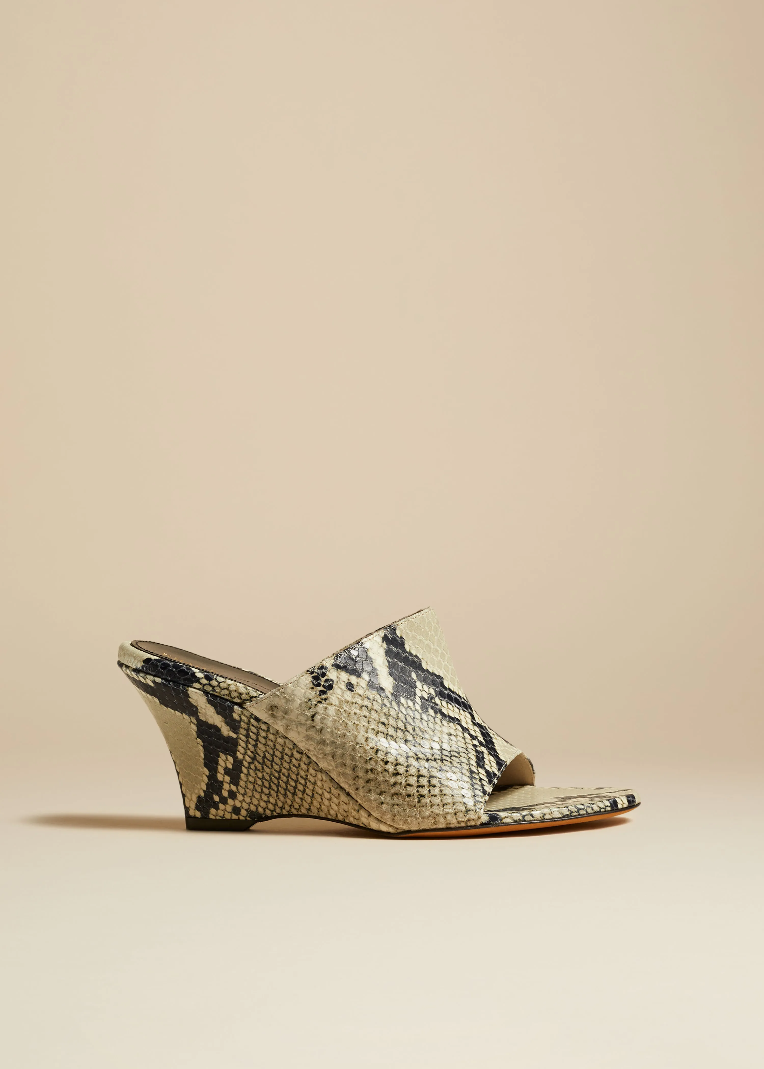 The Marion Wedge Sandal in Natural Python-Embossed Leather sold by KHAITE