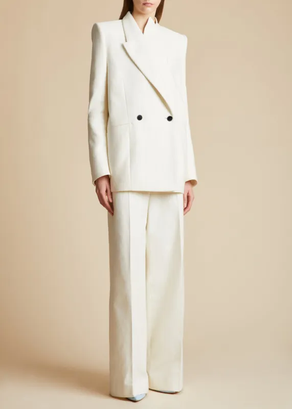The Banton Pant in Cream with Black Stripes sold by KHAITE