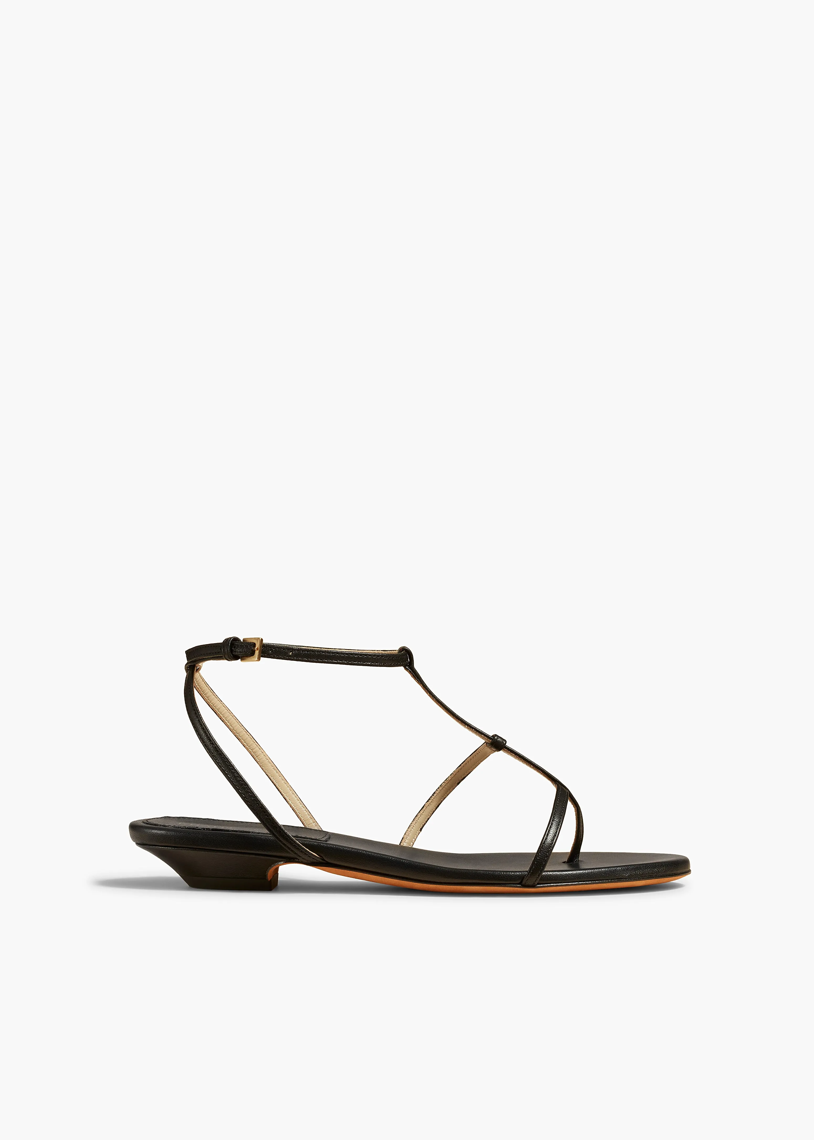Jones Flat Sandal in Black Leather sold by KHAITE
