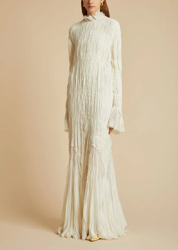 The Marson Dress in Cream sold by KHAITE
