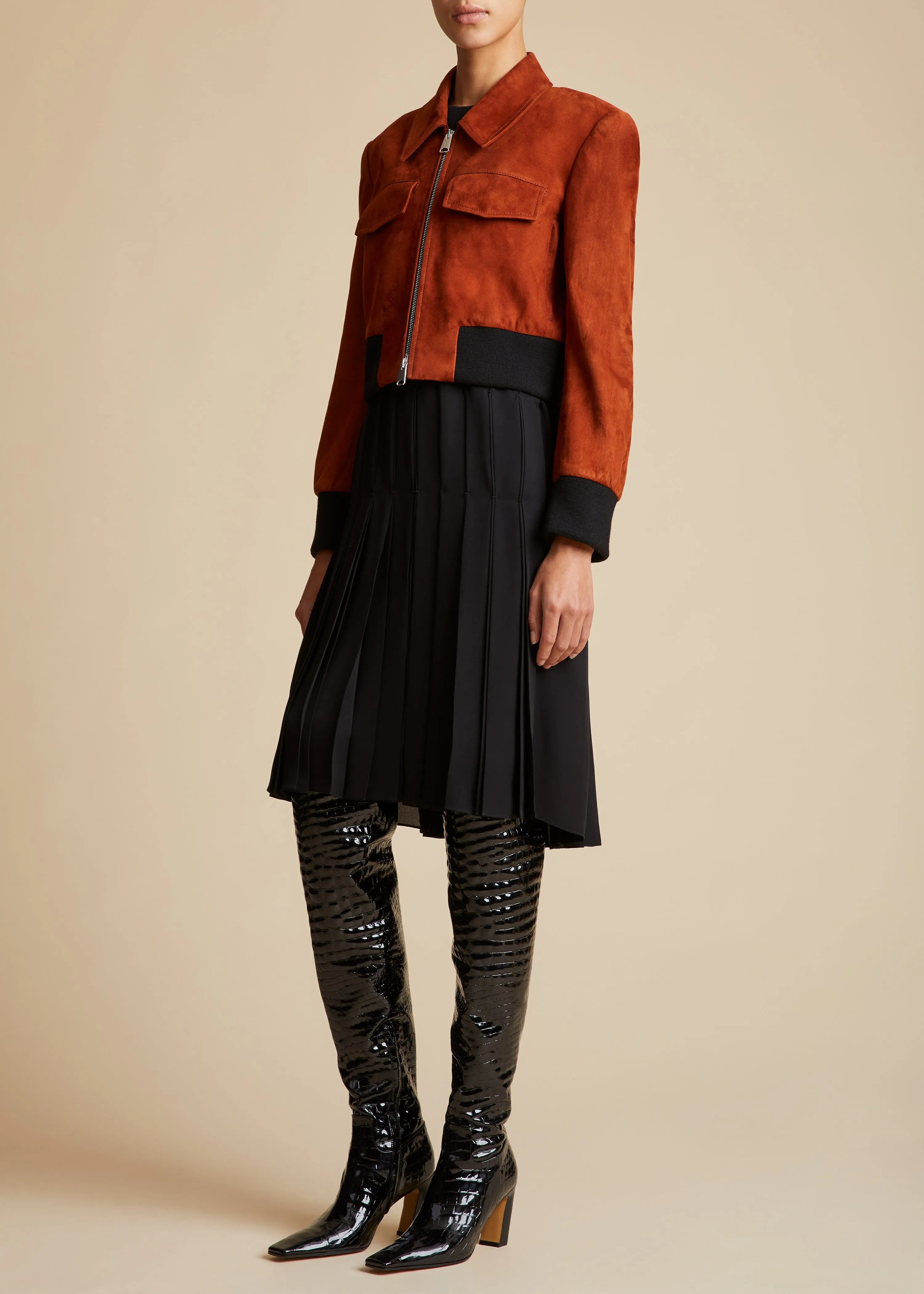 The Hector Jacket in Rust Suede sold by KHAITE