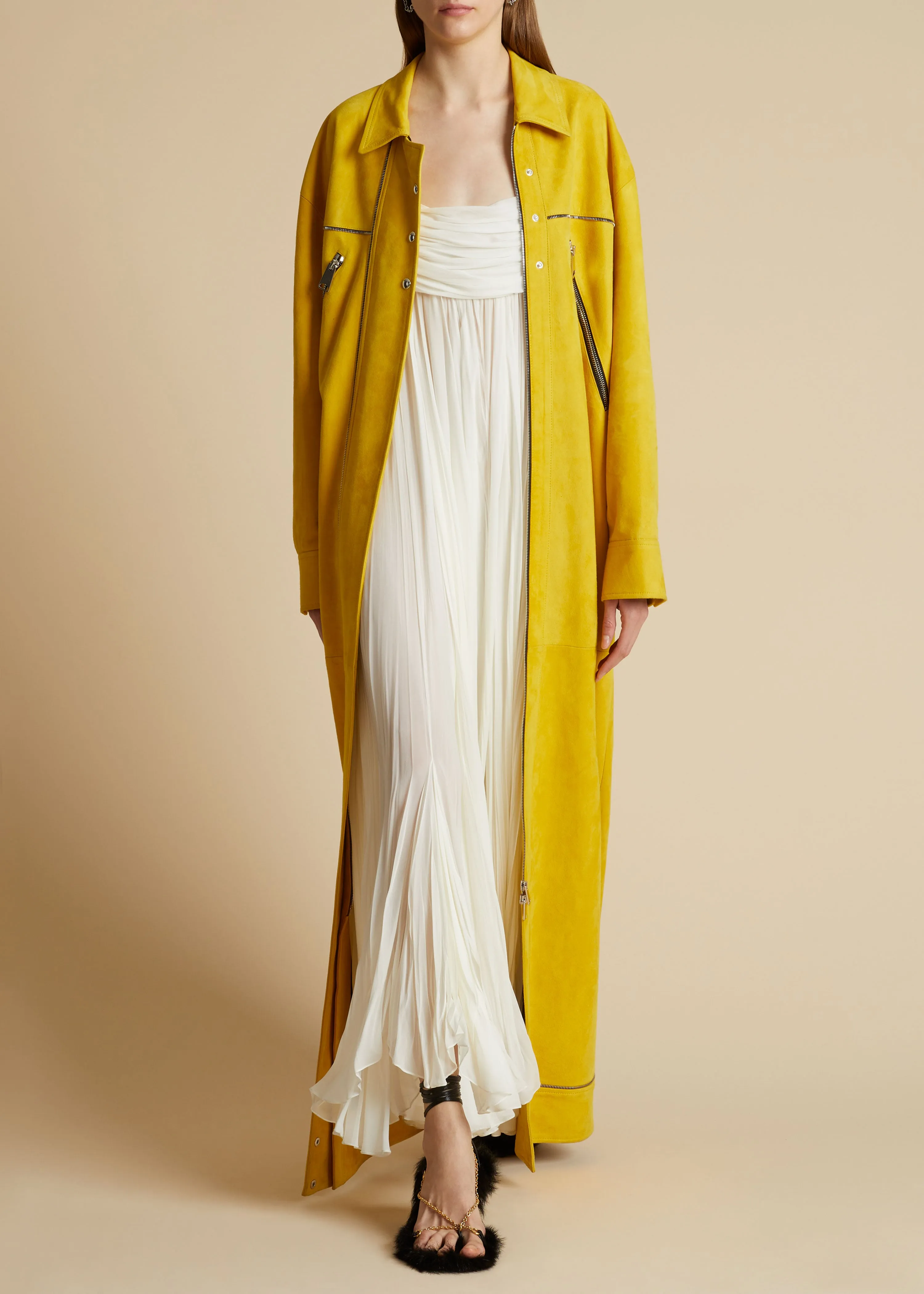 The Erma Coat in Lemon Suede sold by KHAITE