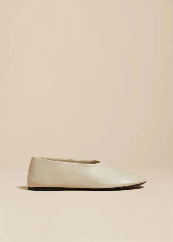 The Maiden Flat in Off-White Leather sold by KHAITE