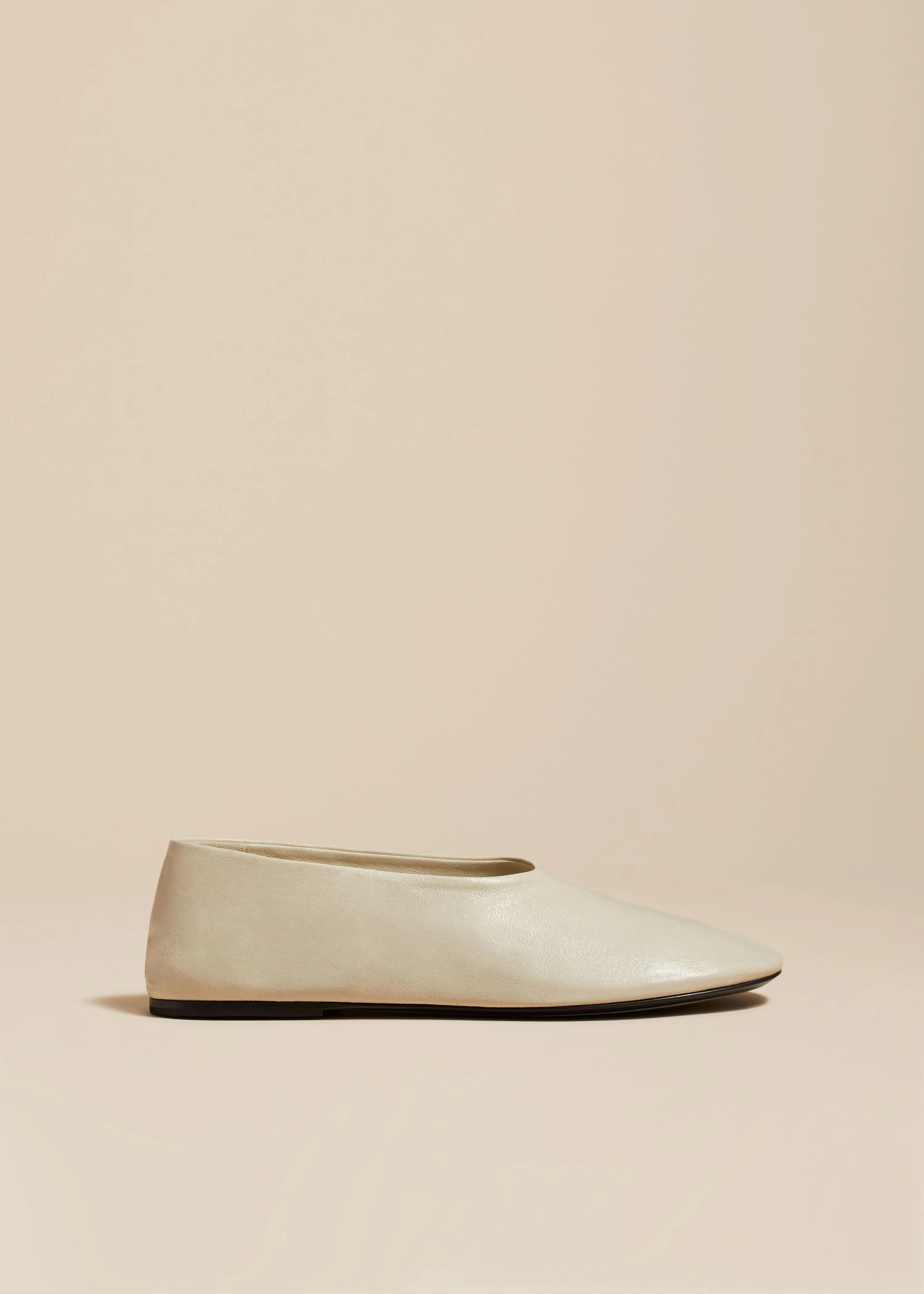 The Maiden Flat in Off-White Leather sold by KHAITE