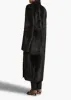 Lolo Shearling Coat in Black sold by KHAITE