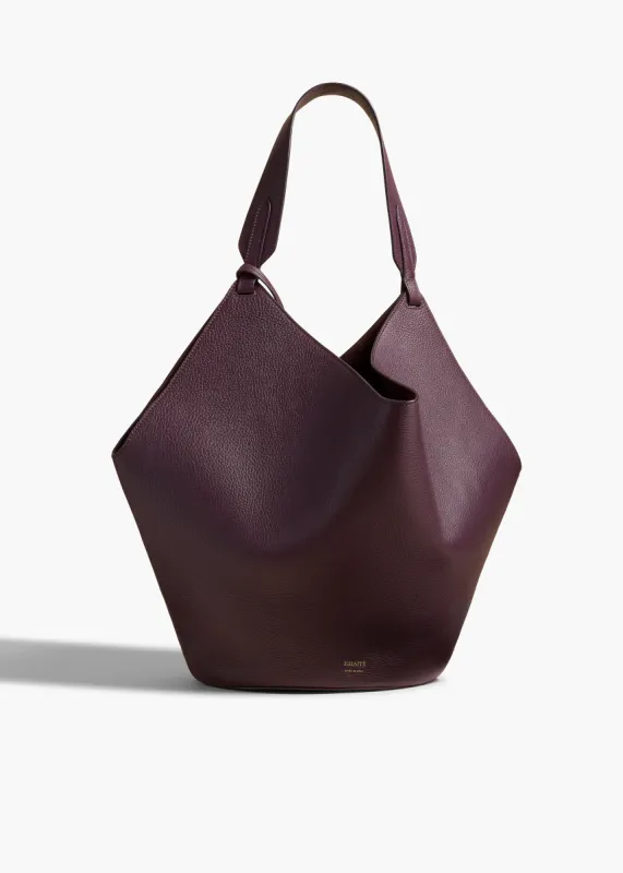 Medium Lotus Tote in Rouge Noir Pebbled Leather sold by KHAITE