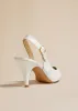 River Slingback Pump in White Crinkled Leather sold by KHAITE