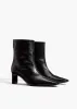 Ona Ankle Boot in Black Glazed Leather sold by KHAITE