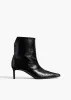 Ona Ankle Boot in Black Glazed Leather sold by KHAITE