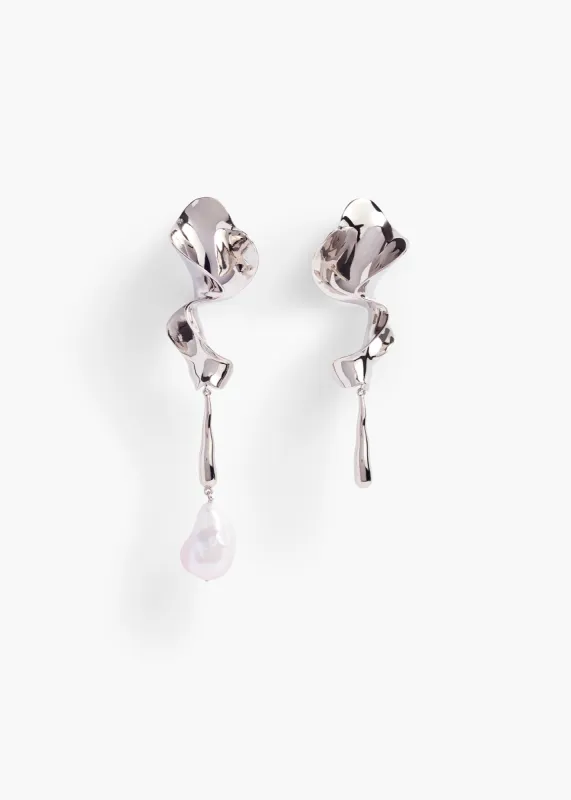 Tidal Earrings with Pearl in Silver sold by KHAITE