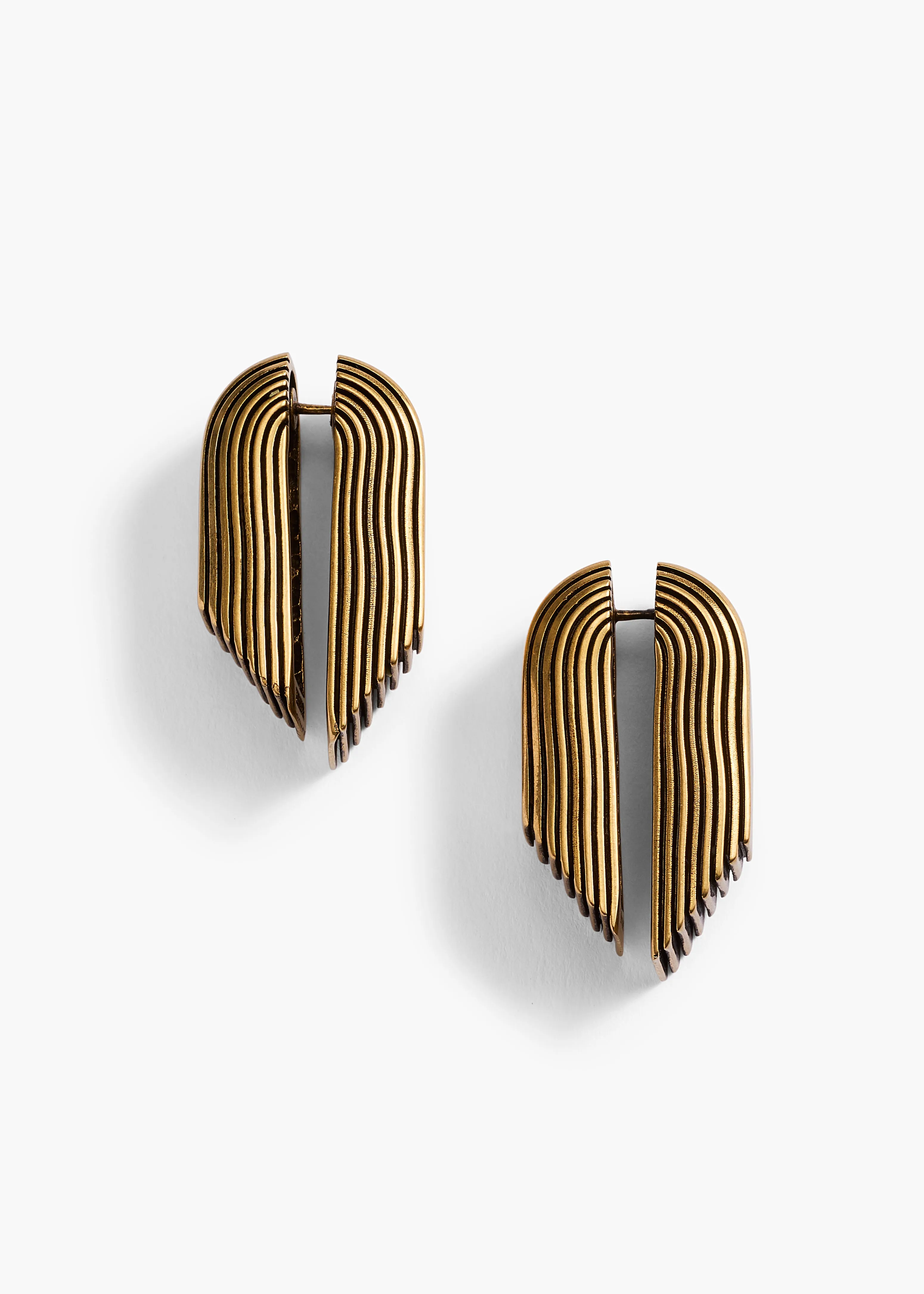 Zucchini Earrings in Antique Gold sold by KHAITE