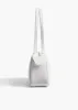 Simona Shoulder Bag in Optic White Crackle Patent Leather sold by KHAITE