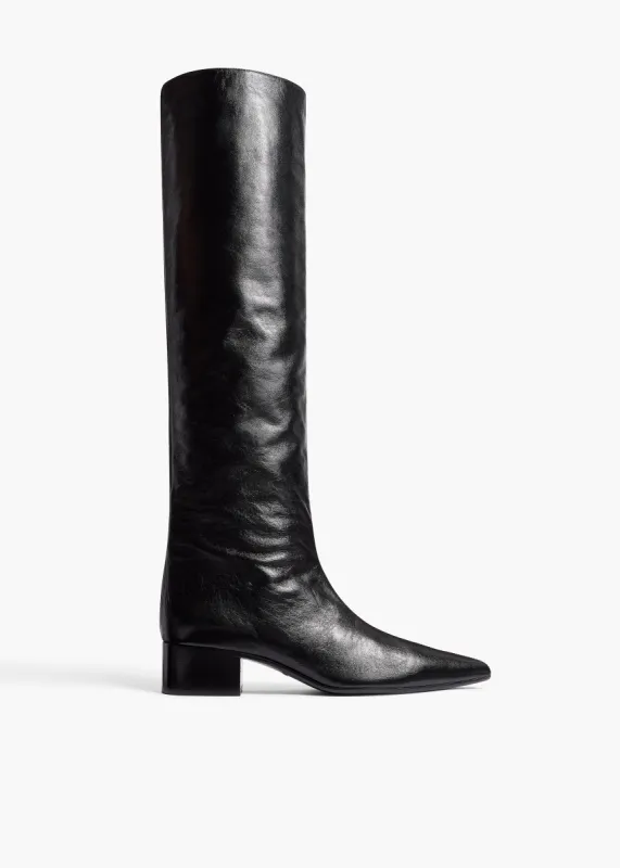 Andee Knee-High Boot in Black Glazed Leather sold by KHAITE