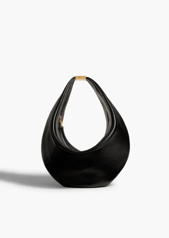 Small Olivia Hobo with Hardware in Black Crackle Patent Leather sold by KHAITE