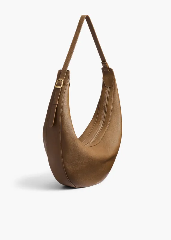 Augustina Hobo in Dark Olive Pebbled Leather sold by KHAITE