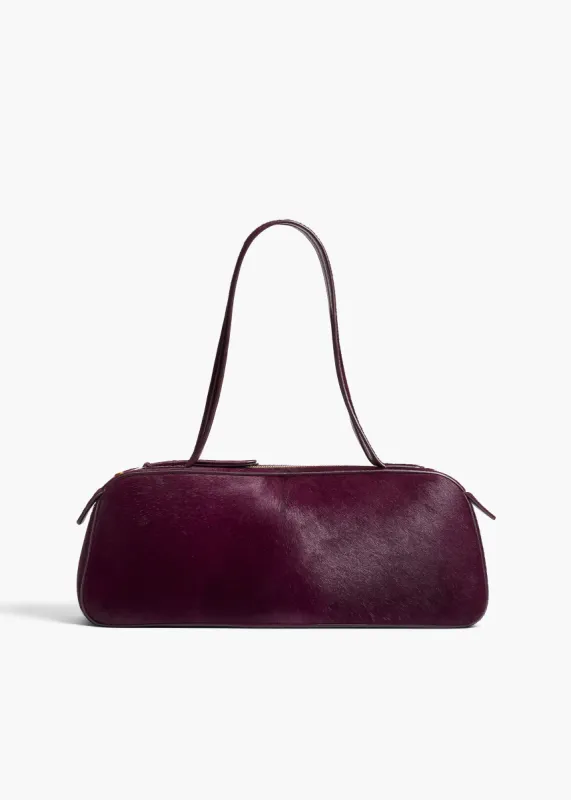 Simona Shoulder Bag in Eggplant Haircalf sold by KHAITE