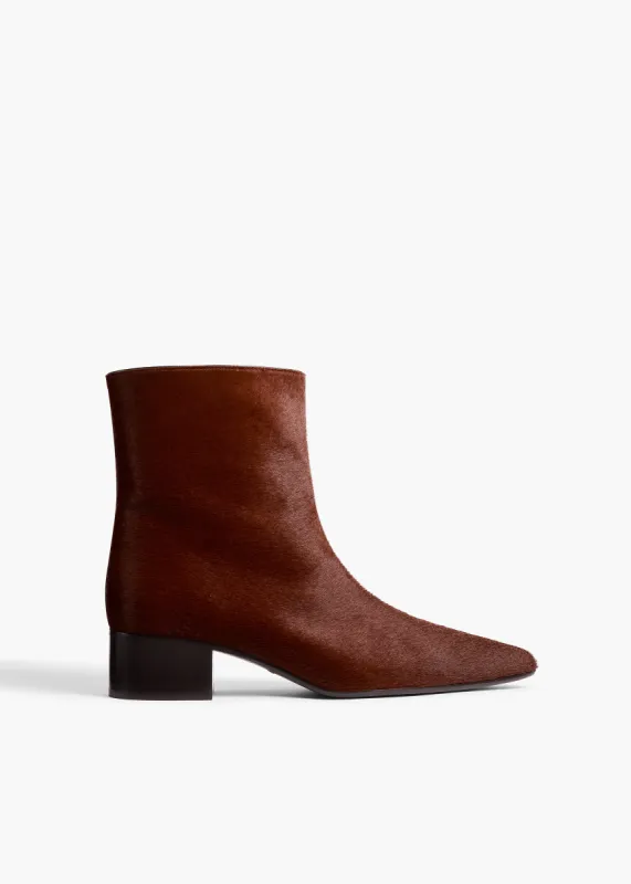 Andee Ankle Boot in Rust Haircalf sold by KHAITE