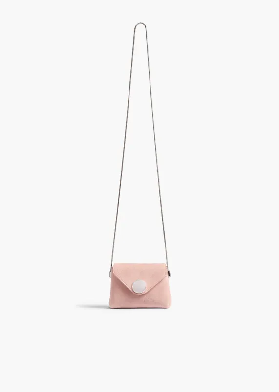Nano Bobbi Crossbody Bag in Soft Pink Suede sold by KHAITE