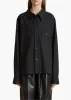Yatty Top in Black sold by KHAITE