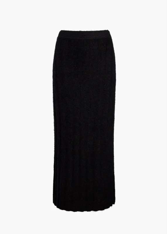 Claire Skirt in Black sold by KHAITE