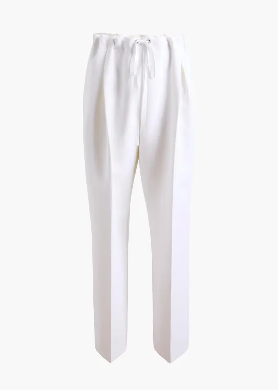 Trenton Pant in Chalk sold by KHAITE