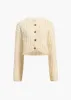 Balser Jacket in Cream sold by KHAITE
