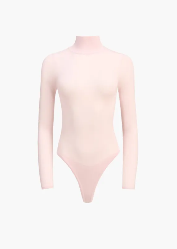 Iveta Bodysuit in Blush sold by KHAITE