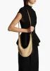 Small Augustina Crossbody Bag in Wheat Suede and Natural Raffia sold by KHAITE