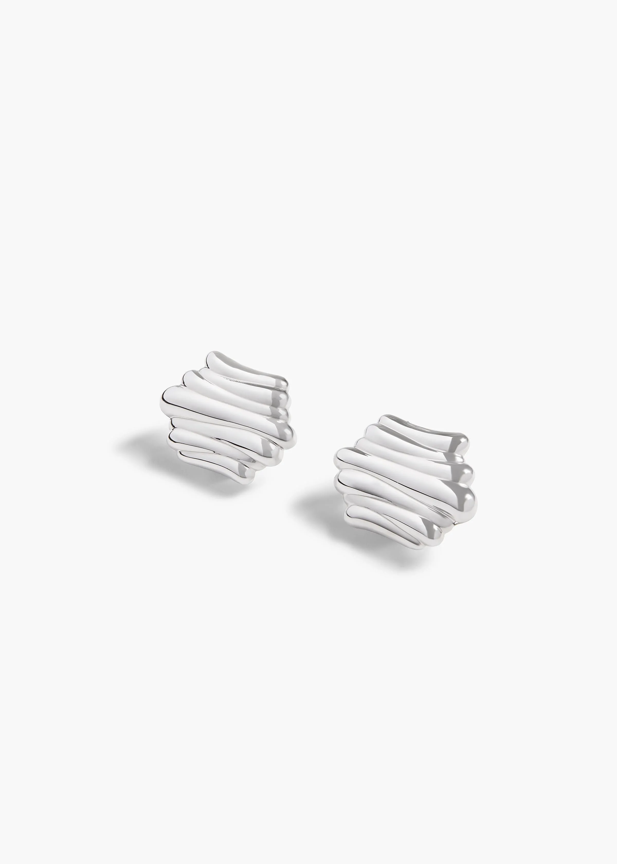 Crema Earrings in Silver sold by KHAITE
